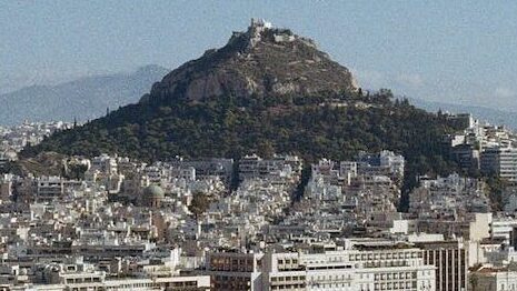 Mount Athos, Greece, pilgrimage site exclusively for men, known for its monasteries and spiritual tranquility.